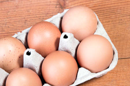 eggs on a wooden tableの写真素材
