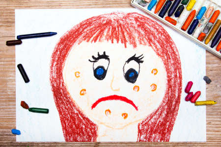 colorful drawing: sad young woman with acneの写真素材