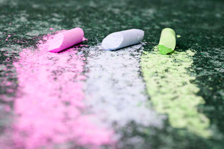 Three colored stripes, drawing with chalk on asphaltの写真素材