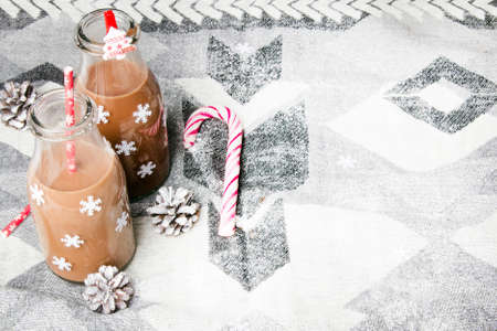 Christmas hot chocolate, sweet cookies  and colorful decorationsの写真素材