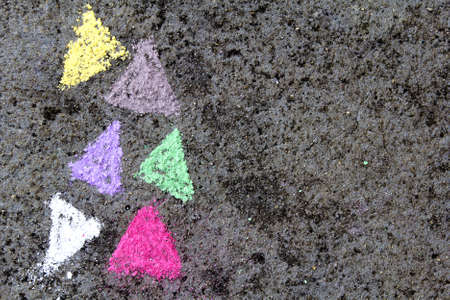  chalk drawing on asphalt: colorful trianglesの写真素材
