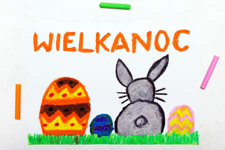 Colorful drawing: Beautiful Polish Easter card with easter eggs and cute bunny. Polish Word: Easterの写真素材
