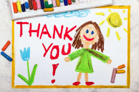 Photo of colorful drawing: Smiling young woman and hand drawn lettering phrase THANK YOUの写真素材