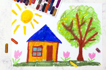 Photo of colorful drawing: Sunny day,a small cute house next to a tree. Idyllic spring rural landscape.
の写真素材