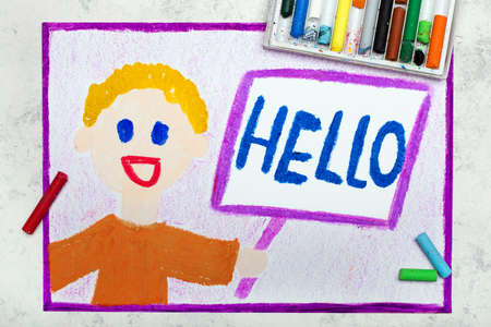 Colorful drawing: smiling boy holding a white sign with word HELLOの写真素材