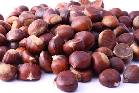 Sweet chestnut heap in white background.の写真素材