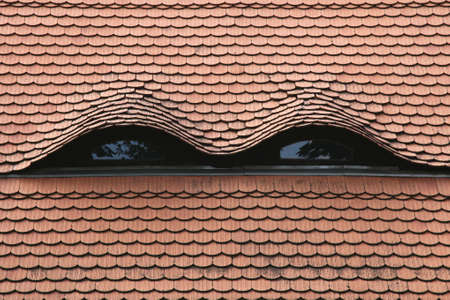Skylights in a tiled roof.の写真素材