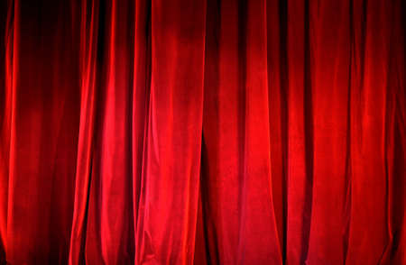 Part of a lighted red curtain. の写真素材