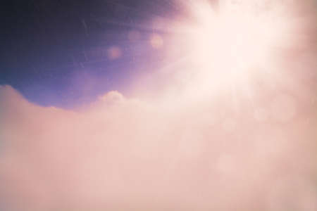winter sky extremely highly mountains wind clouds sun beam bokeh abstract backgroundの写真素材
