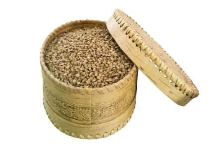 Buckwheat grains macro on white background.の写真素材