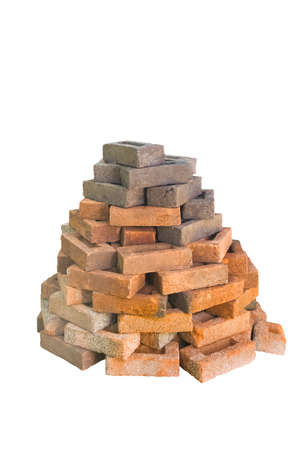 Many street stone bricks stacked pile isolated on a white backgroundの写真素材