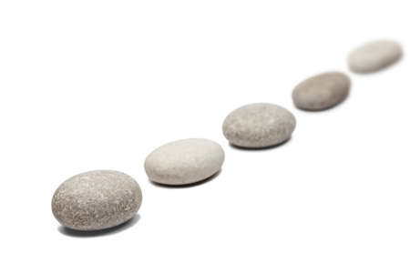 round stones isolated on whiteの写真素材