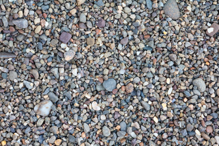 Small stones pebbles sand background