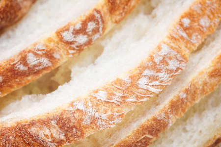 Slices of white bread close up macro backgroundの写真素材