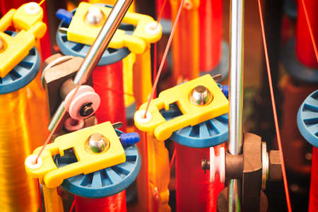 Rolls of industrial cotton fabric for clothing cloth textile manufacture on machineの写真素材