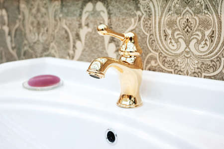 Bathroom classic nterior with sink and classic retro style bronze faucetの写真素材