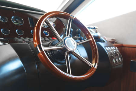 steering wheel on a luxury yacht.の写真素材