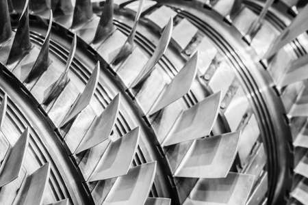 Steel blades of turbine propeller. Close-up view. In B/W. Selected focus on foregroundの写真素材