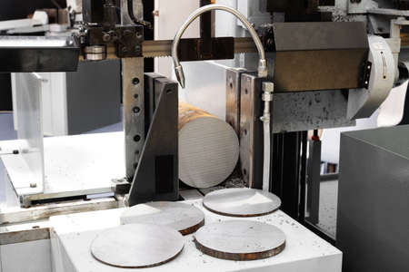 industrial metal machining cutting process of blank detail by mechanical electrical sawの写真素材