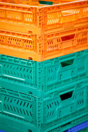 colorful plastic boxes stacked one on the otherの写真素材