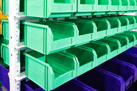 Plastic containers on the modern warehouse for piece small storage of goodsの写真素材