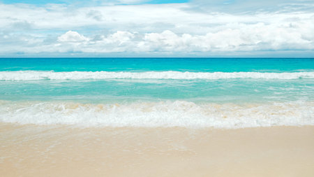yellow warm sand and summer sea with sky and free spaceの写真素材