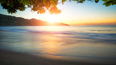 Art Beautiful sunset over the tropical beachの写真素材