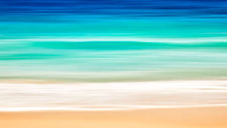 Empty sea and beach art background with copy space, Long exposure, blur motion blue abstract vintage tinted gradient backgroundの写真素材