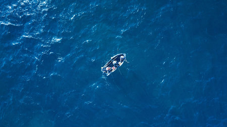 Sea surface with boat aerial view