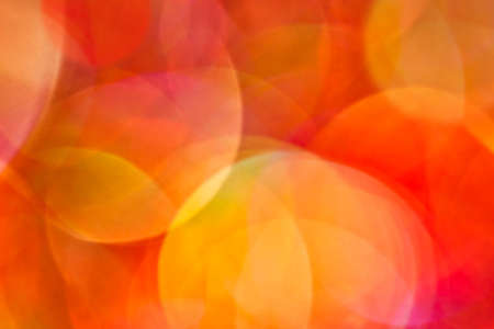 Blurred red glitter vintage lights background. defocusedの写真素材