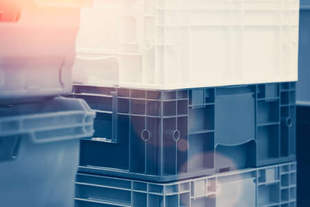 delivery cargo logistic shipping concept, plastic boxes are stackedの写真素材