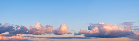 Blue sky dawn sunset panorama with white clouds and sun  rays. Summer spring heaven concept....