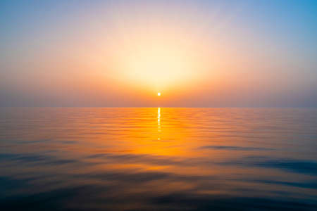 Beautiful sunset on the beach and sea - Vintage Filterの写真素材
