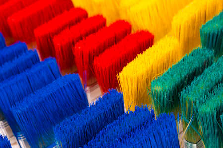 abstract multicolor texture background, renovation concept, row of many multicolored brushes close up, texture renovation and creative backgroundの写真素材