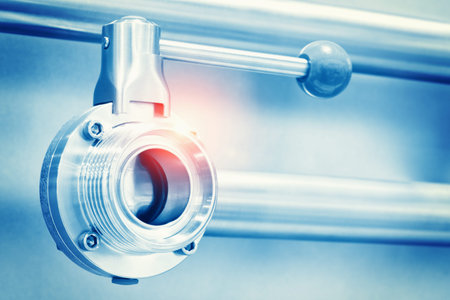 Stainless steel pipes in the factory. Construction on food production, Abstract industry background.
