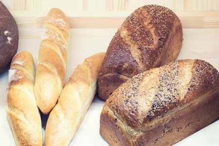 Lots of bread on the store or bakery.