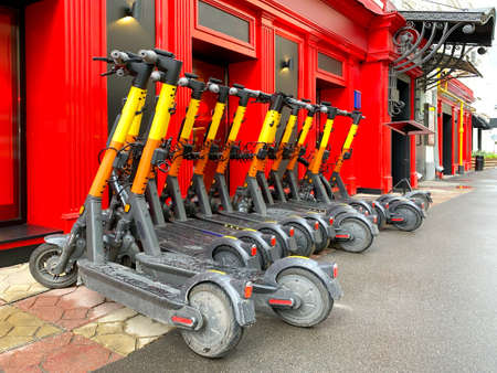 Parking of electric scooters near the train stationの写真素材