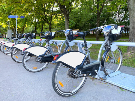 bikes in the parking lot for bicycles, the view from the side