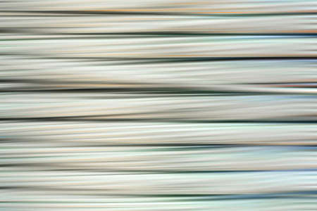 Bright multicolored abstract metal background of horizontal blurred linesの写真素材