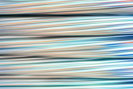 Bright multicolored abstract metal background of horizontal blurred lines
