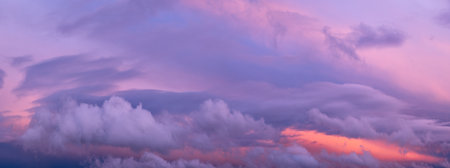 Panoramic landscape of bright red orange sunrise sunsetの写真素材