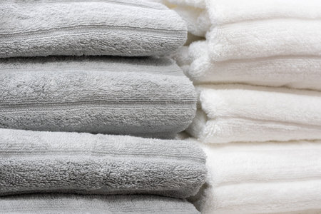 Colorful folded towels stack closeup picture.の写真素材