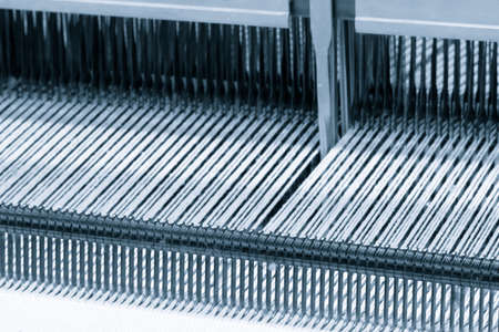 straight strands texture background, sewing equipment, loom equipment at a garment factoryの写真素材