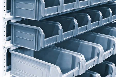 rows of multicolored plastic boxes for components