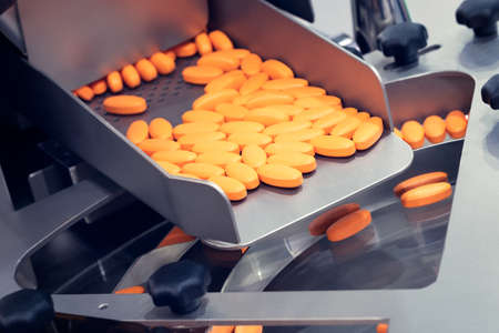 Pharmaceutical production line, production of tablets or vitamins manufacturing, tablet conveyorの写真素材