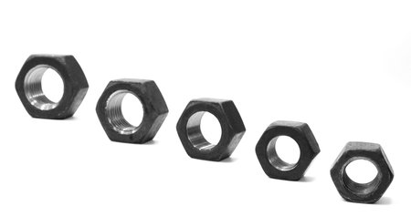 Metal nuts isolated on white backgroundの写真素材