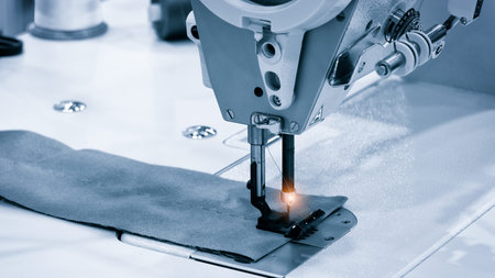 sewing machine and item of blue clothing