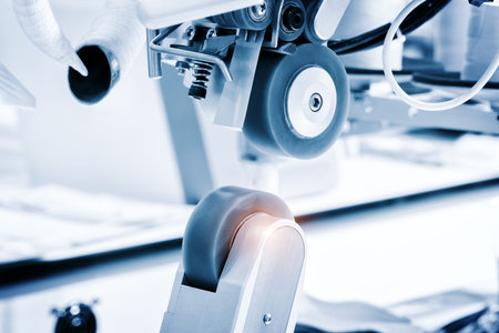 Sewing equipment, loom equipment at a garment factory, industrial concept background