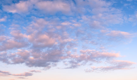 blue sky background with tiny clouds
