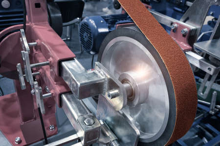 abrasive treatment tools, belt grinder, Close-up, industrial metalworking conceptの写真素材